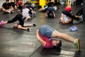 Personal Trainer giving fitness instruction at a Crossfit group class