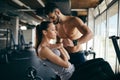 Personal trainer giving instructions in gym Royalty Free Stock Photo