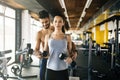 Personal trainer giving instructions in gym Royalty Free Stock Photo