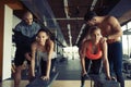 Personal trainer giving instructions in gym Royalty Free Stock Photo