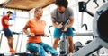 Personal trainer giving instructions in gym Royalty Free Stock Photo