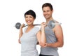 Personal trainer helping woman with weight lifting bar Royalty Free Stock Photo