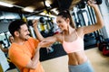 Personal trainer instructing trainee Royalty Free Stock Photo