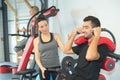 Personal trainer instructing trainee in gym Royalty Free Stock Photo