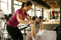 Personal trainer working exercise with senior woman in the gym. Royalty Free Stock Photo