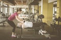 Trainer working exercise with senior woman in the gym. Royalty Free Stock Photo