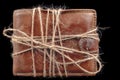 Personal wallet tied with jute twine. Personal finances related to the crisis