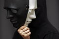 Personality mask, spy,hypocrisy, falsification of documents,hooded man with black white disguises Royalty Free Stock Photo