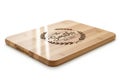 Personalized bamboo cutting board with family name engraved isolated on white background Royalty Free Stock Photo