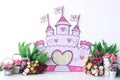 Personalized romantic castle decor with colorful spring flower pots, for the first birthday