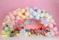 Personalized romantic garden decoration with colorful balloon arch birds, flowers and lights for 1st birthday