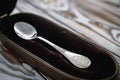 personalized silver baby spoon in a velvet case