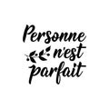 Nobody is perfect - in French language. Lettering. Ink illustration. Modern brush calligraphy