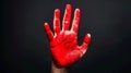 A Persons Hand Covered in Red Paint
