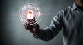 Cybersecurity concept with person touching a digital lock icon for data protection Royalty Free Stock Photo