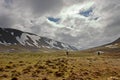 Persons Walking Tundra in Svalbard Royalty Free Stock Photo