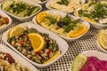 Perspective close-up shot of traditional tasty appetizers for turkish drink of raki in night dinner at Izmir in Turkey