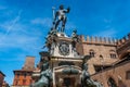 Perspective and detail of the Fountain of Neptune next Re Enzo palace, Bologna ITALY Royalty Free Stock Photo