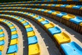 Perspective diagonal curve abstract view on amphitheater theater blue yellow plastic seats. Seats circle. Amphitheater seats archi