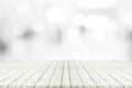 Perspective empty white wooden table on top over blur background Royalty Free Stock Photo