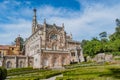 Luso, PORTUGAL - June 14, 2022 - Perspective of facade of BuÃ§aco palace in neo manueline style with towers in garden