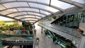 Perspective of indoor garden between shop under skylight roof at True digital park building