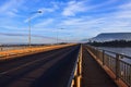 Perspective of japan laos bridge in morning light crossing mekong river in champasak southern of laos