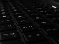 Keyboard white / gray / black laptop. Laptop keyboard. Laptops are mobile. Black keyboard on a gray laptop. keyboard close up with Royalty Free Stock Photo