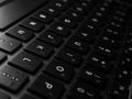 Keyboard white / gray / black laptop. Laptop keyboard. Laptops are mobile. Black keyboard on a gray laptop. keyboard close up with Royalty Free Stock Photo