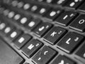 Keyboard white / gray / black laptop. Laptop keyboard. Laptops are mobile. Black keyboard on a gray laptop. keyboard close up with Royalty Free Stock Photo