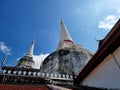 The perspective of the main larger stupa on the blue sky background