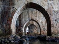 Perspective of the old shipyard Tersane through stone arches in Turkish Alanya Royalty Free Stock Photo