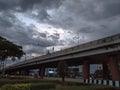 Perspective photo of the flyover at the intersection in the early morning time.