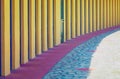 Perspective of repeated cabins for beach holidays. Long row of concrete cabins to allow vacationers to change or place objects.