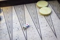 Perspective shoot of dices on backgammon under open light with play stones Royalty Free Stock Photo