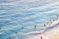 Perspective shoot of people enjoying on the sea at the beach for sunset time