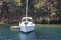 Perspective shoot of sailing yacht near shore at morning time