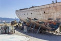 Perspective shot of back side fishing boat on ground for painting of trunk at Lesvos, Kalloni Royalty Free Stock Photo