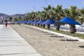 Perspective shot of blue sun shading on the coastline at summertime