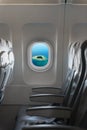 Perspective Shot of a Tropical Island through Passenger's Window