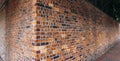 Perspective, side view of old red brick wall texture background Royalty Free Stock Photo