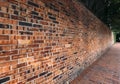 Perspective, side view of old red brick wall texture background Royalty Free Stock Photo