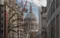 A perspective street view looking towards the dome of St Paul s Cathedral Royalty Free Stock Photo