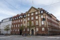 Perspective street view of an ornate building in classical European designs