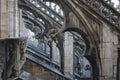 The perspective and strict symmetry of the flying buttresses of the Milan Cathedral Royalty Free Stock Photo