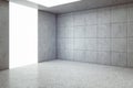 Perspective view on blank glowing white wall part with place for advertising text or logo brand in industrial style empty room Royalty Free Stock Photo