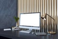 Perspective view on blank modern computer monitor with blank place on dark office table with notebook, flower coffee pot on golden