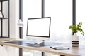 Perspective view on blank white modern computer monitor with space for your logo or text on stylish wooden table on panoramic