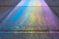 Perspective view of colorful rainbow drawing with chalk on pavement. Royalty Free Stock Photo