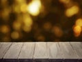 Perspective view of empty concrete surface on blurred gold lights background.